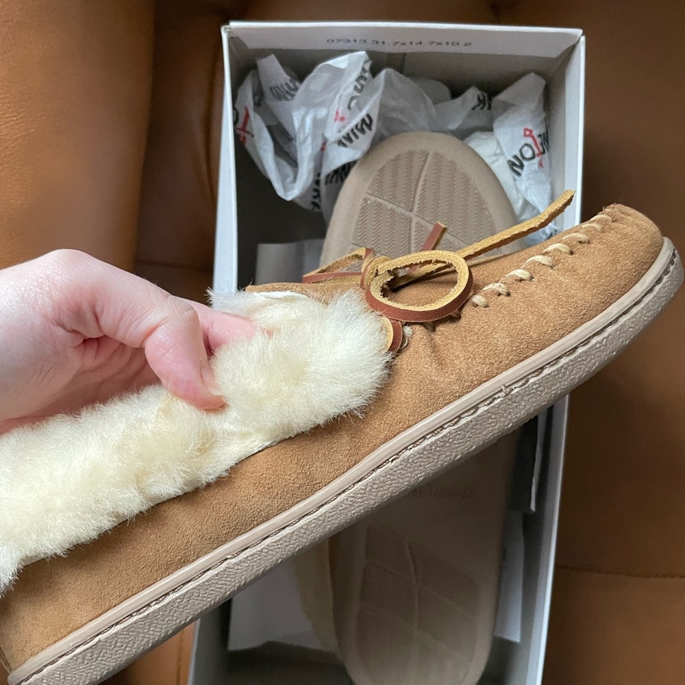 Brand new Minnetonka slippers. Never worn. New in box. Size 8